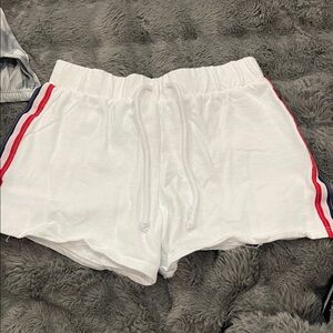 Classic White Athletic Shorts with Red and Blue Stripes